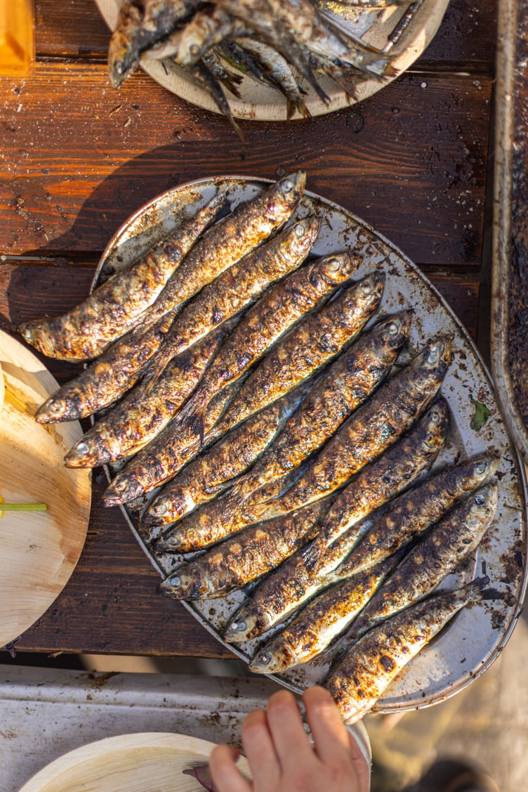 A succulent plate of sardines, freshly grilled.