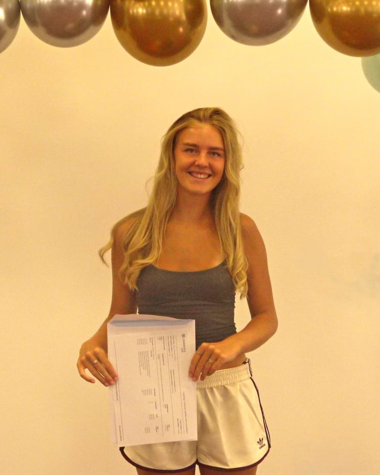 Success and smiles for students celebrating their results