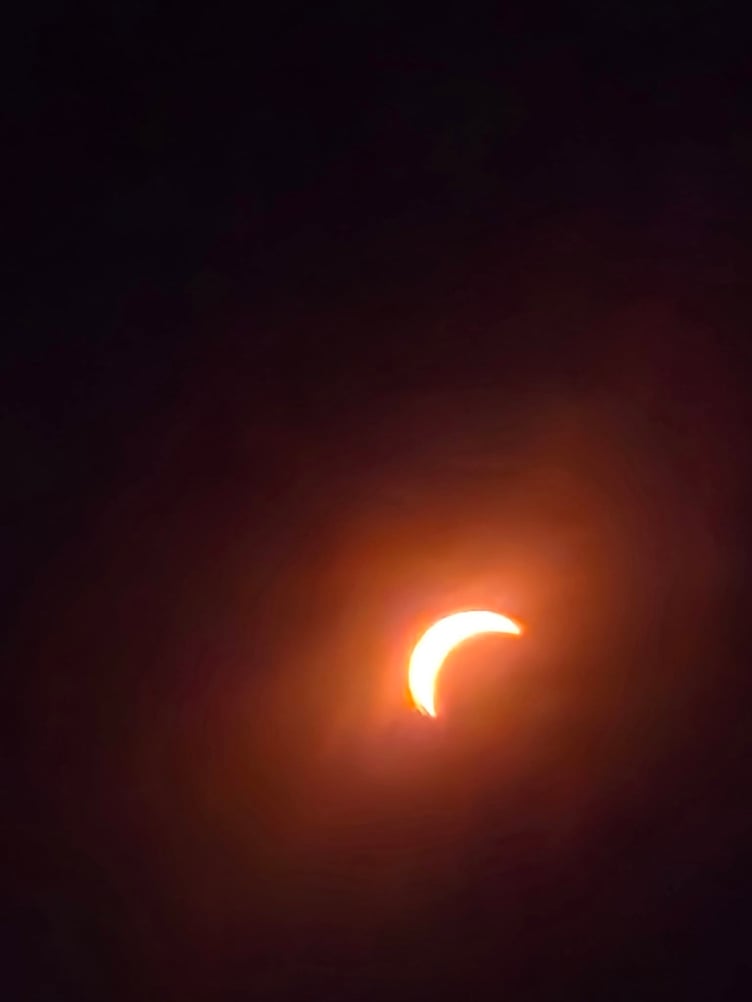 Okehampton residents watched as the Sun was reduced to a fiery crescent. Picture: Jimmy Prescott.