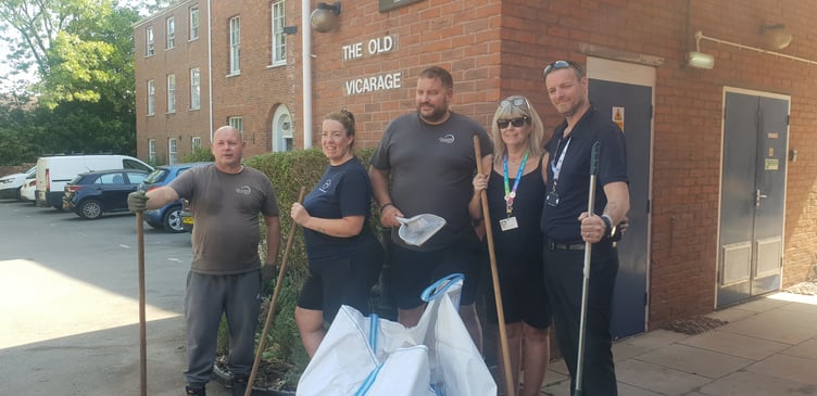 Staff from Churchill Environmental Services and Chequers grounds maintenance contractors who helped make Wellington's Old Vicarage spick and span for a 70th anniversary party.