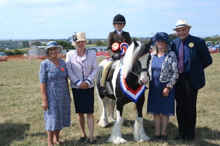 Smiles were wide for a photo with a horse rider's pride (Picture: Rodney Parrish)