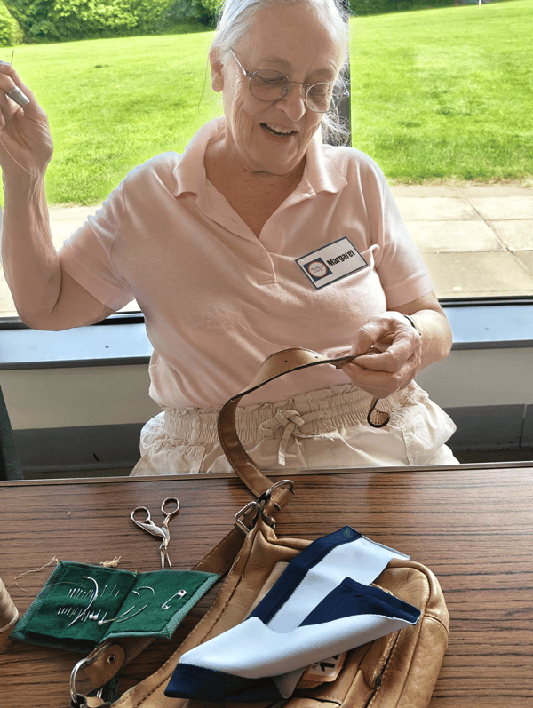 Stitching work at Petersfield Repair Cafe.