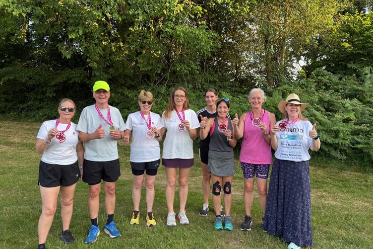 Some of the Serpent Trail runners with their medals