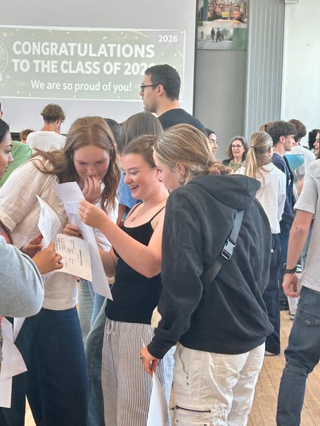 Student collecting their results at Weydon School 2026