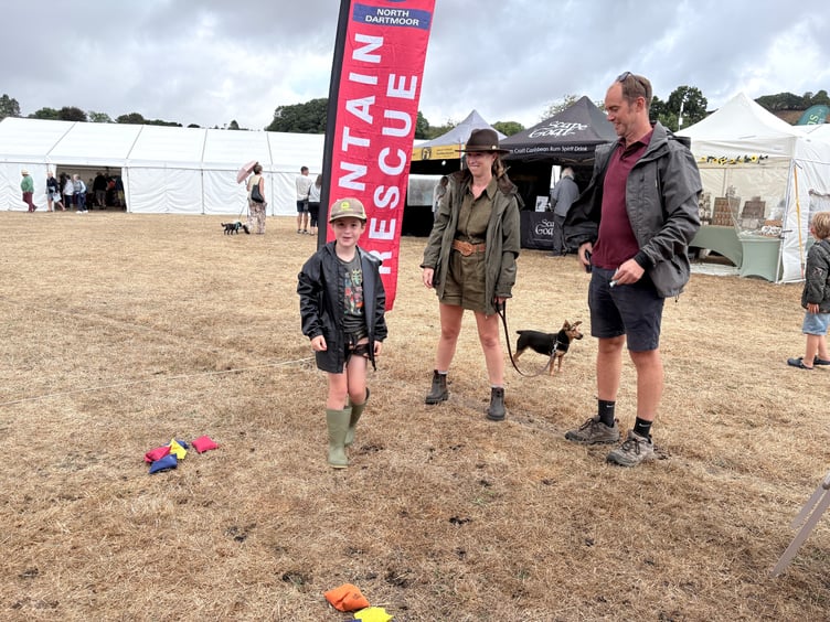 L-R: George, Katrina and Rob Lintott at the coconut shy.