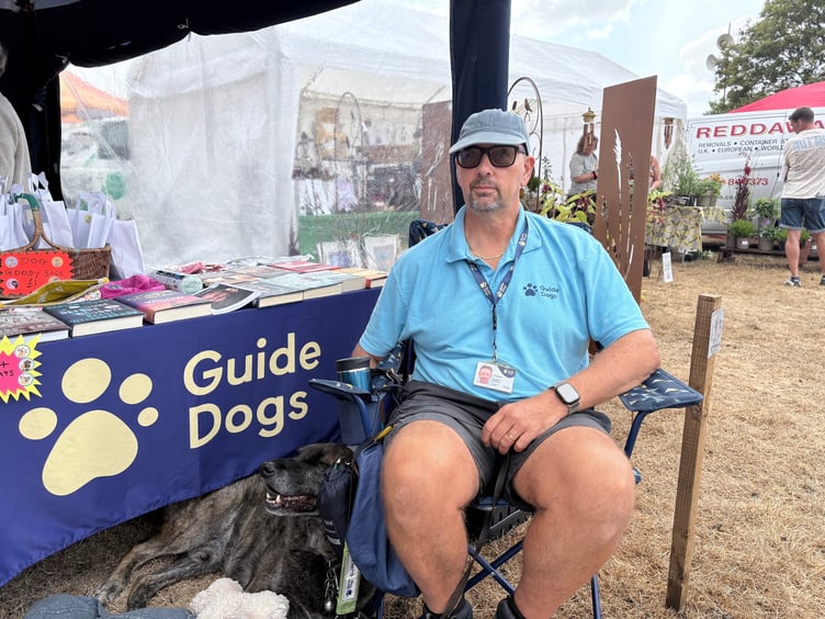 Guide Dogs volunteer Richard Bowman with his guide dog Fordy.