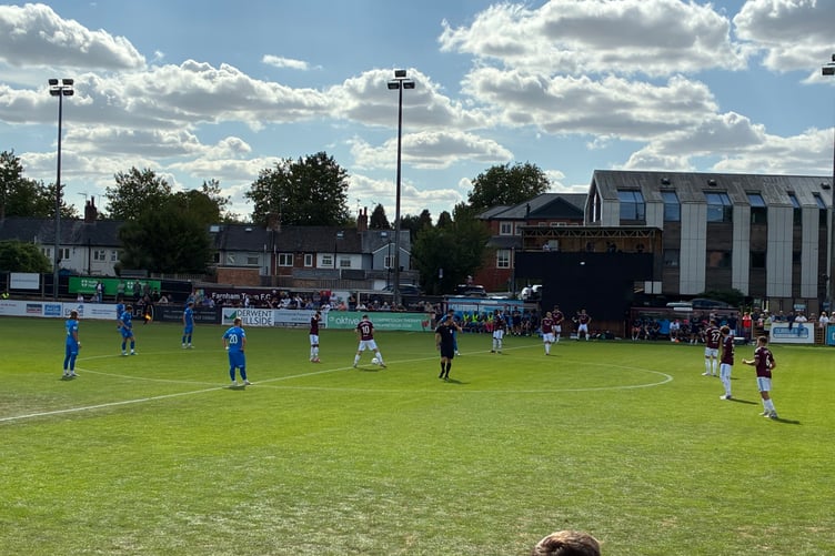 Action from Farnham Town's National League South match against Billericay Town