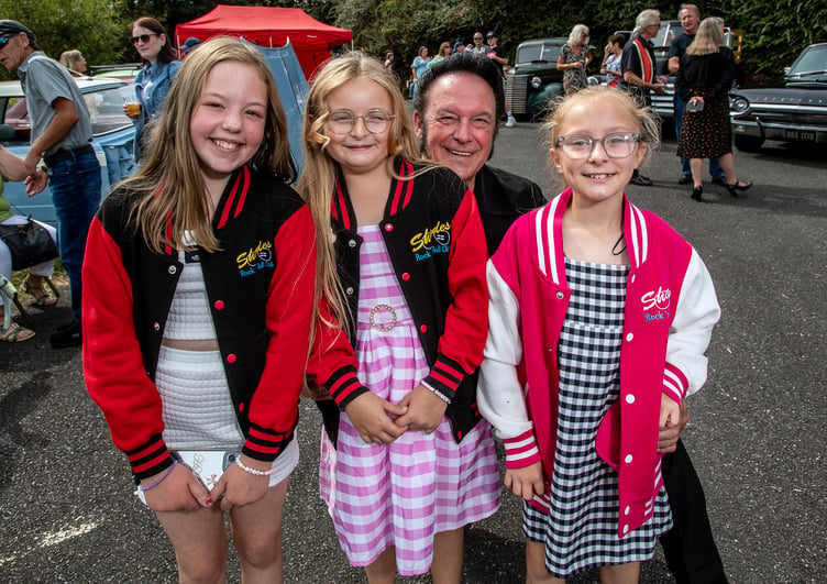 Joint organiser and lead singer of Play it Cool Tory Wills with some young fans. (Picture: Paul Williams)
