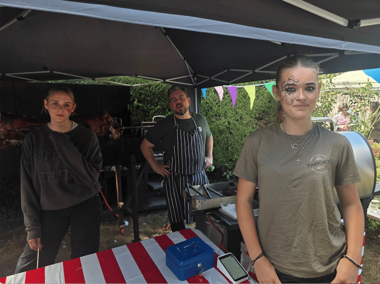Preparing the hog roast and barbecue at Langford Budville's Martlett Inn for a village jamboree on Sunday.