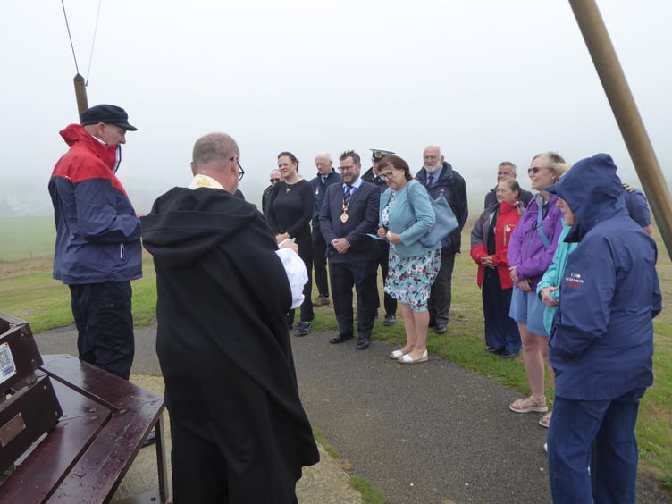 Residents braved the weather during the ceremony at the Elizabeth Mast, on the highest point of the Downs. (Picture: Paul’s Photography)