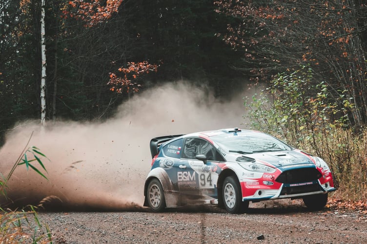 A stock image of a rally car.