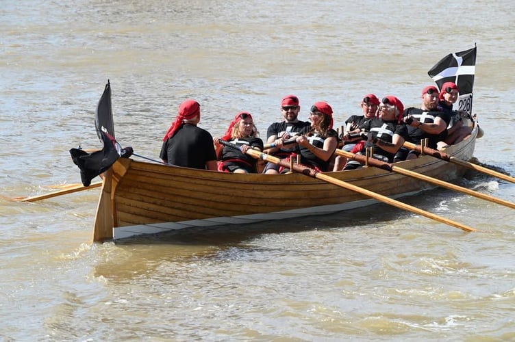 The 'Cornish Pirates' team on board their boat. (Picture: Mevagissey Rowing Club)