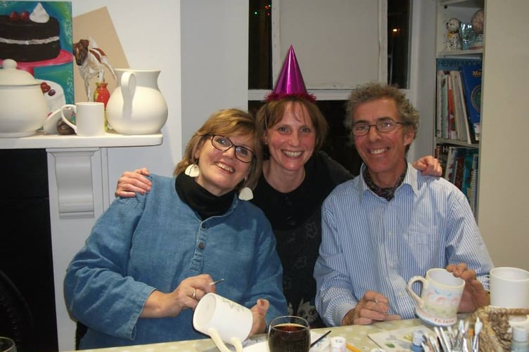 Tessa Thonett, Michelle Jackson and Markus Thonett get in the Christmas spirit in 2012.