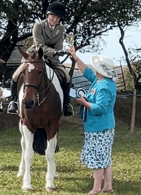 Cutcombe Show's 2026 pony champion trophy being presented.