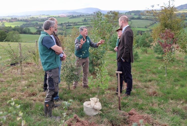 The Prince of Wales joins volunteers participating in a seed collection activity during a visit to White Castle Farm in Abergavenny, to meet representatives from Stump Up For Trees, a community-based environmental charity working across South Wales to restore native woodland and recognise its powerful potential to support sustainable solutions to flooding risk. Photo by Chris Jackson/PA Wire
