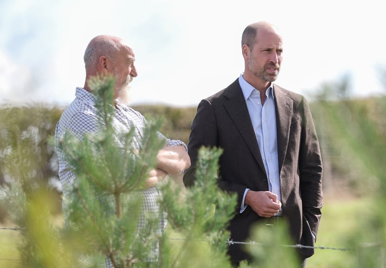 The Prince of Wales speaks with Jim Beavan from Great Tre-rhew Farm during a visit to White Castle Farm in Abergavenny (Pic Chris Jackson/PA Wire)