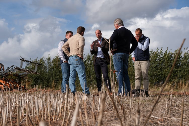 The Prince of Wales, in his role as the Duke of Cornwall, speaks with Regenified's Josh Fontenot and John Gregson during a visit Monkhall Farm