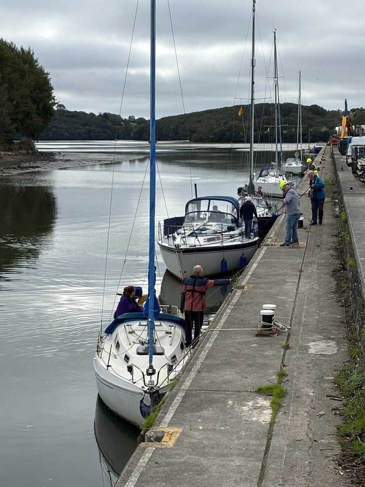 Boats lined up on the Truro River ready for the TBOA winter lift