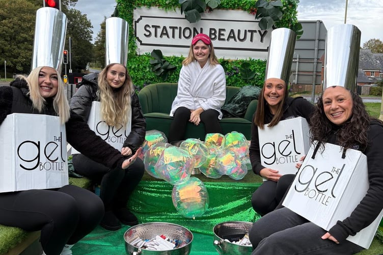Gel of a show! Carnival revellers make a colourful splash